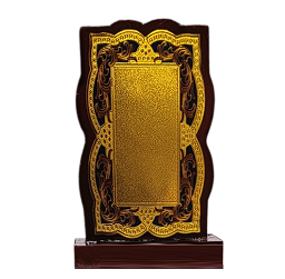 Close-up of a beautifully crafted wooden memento with a gold plaque; perfect for employee recognition.